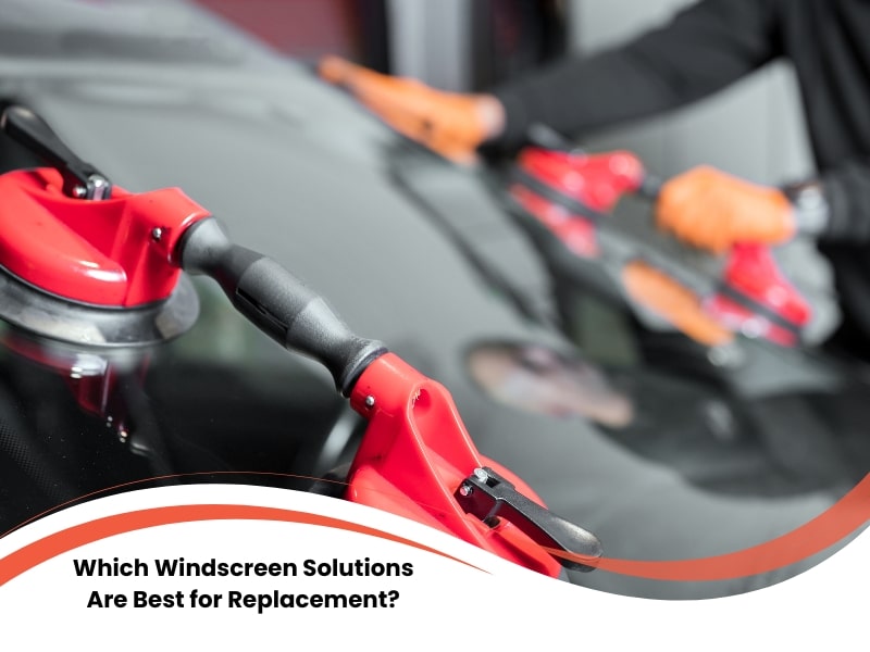 Windscreen solutions for replacement with technicians using red suction lifters on car glass.